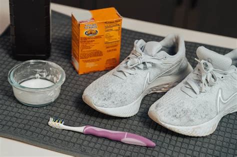 washing nikes with toothbrush.